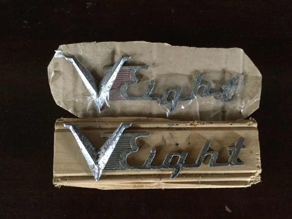 1953 1954 Dodge V Eight Trunk Badge pair one solid one pieces complete