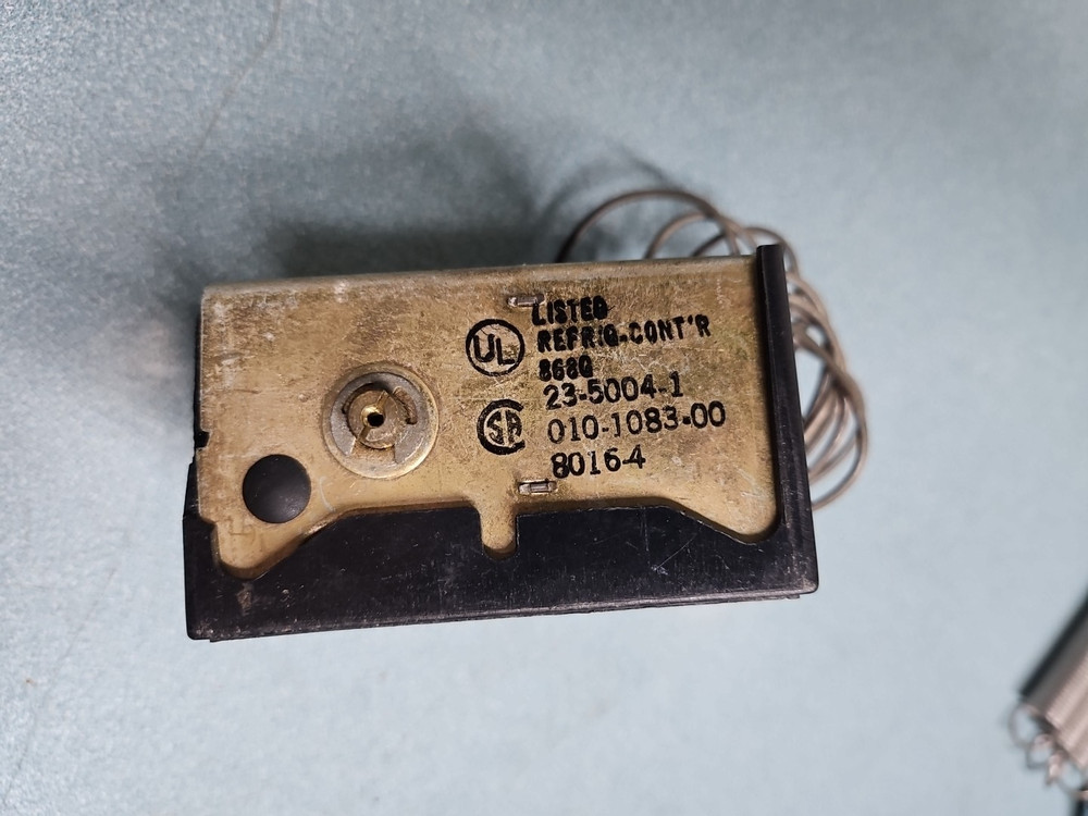 Assorted Manitowoc Ice machine parts.