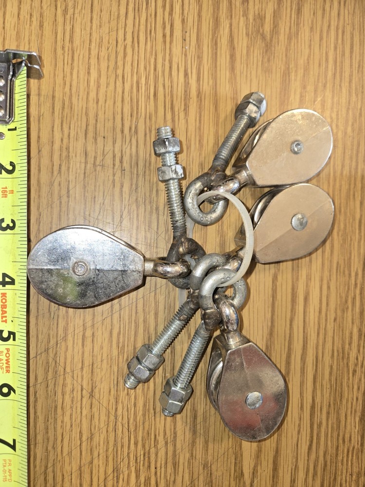 4 pulleys for rope,with Bolts Welded Onto Pullys