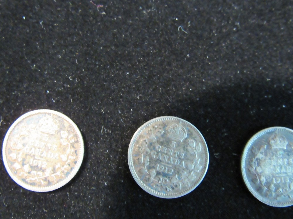 Five Canandian nickels silver