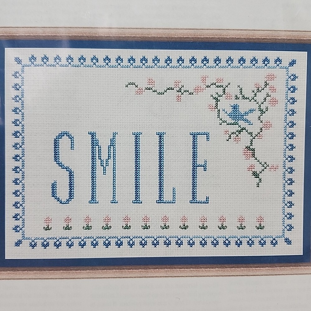 A Pegasus Publication Smile Sampler Counted Cross Pattern Chart Chartpack #475