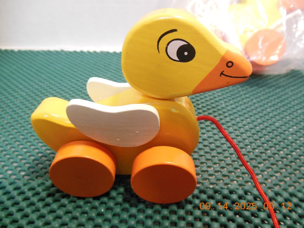 Wooden Pull Behind Ducks One small 1 bigger new and used