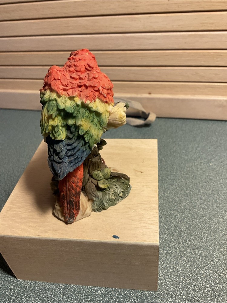 Hand Painted Macaw Parrot Standing On A Branch