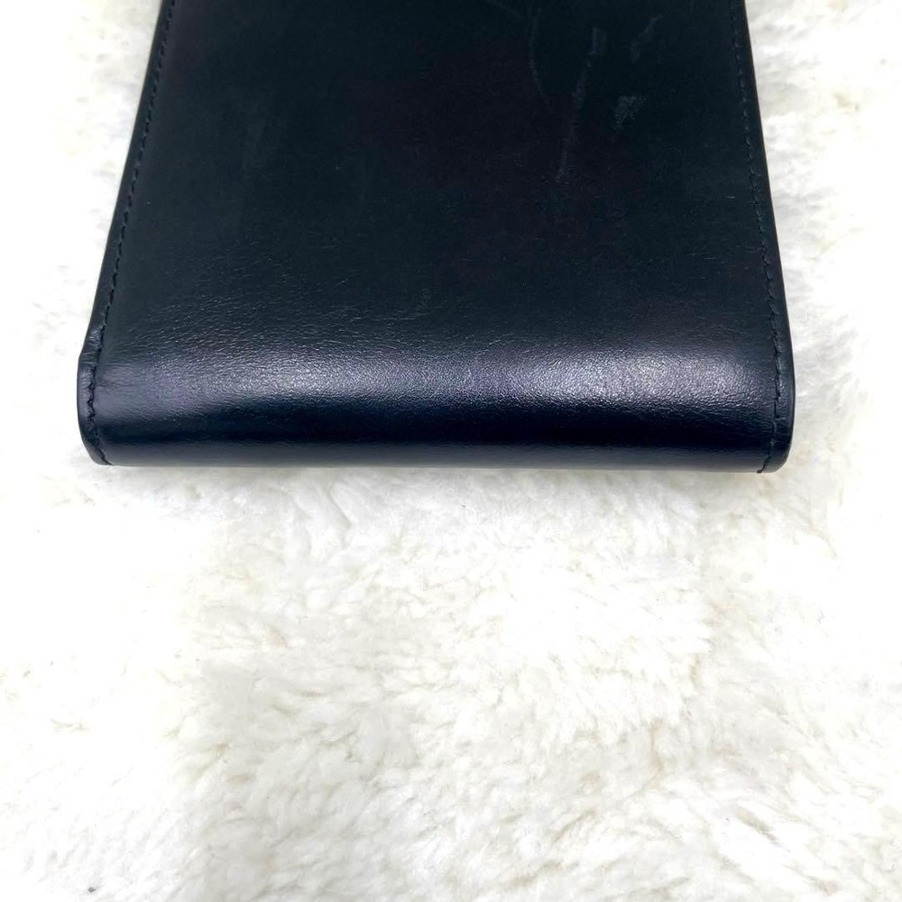 GUCCI Embossed Logo Black Folding Wallet