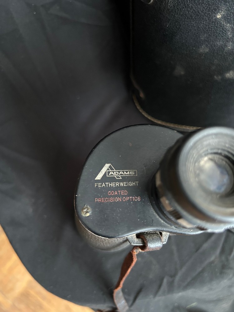 Vintage Adams binoculars with leather case