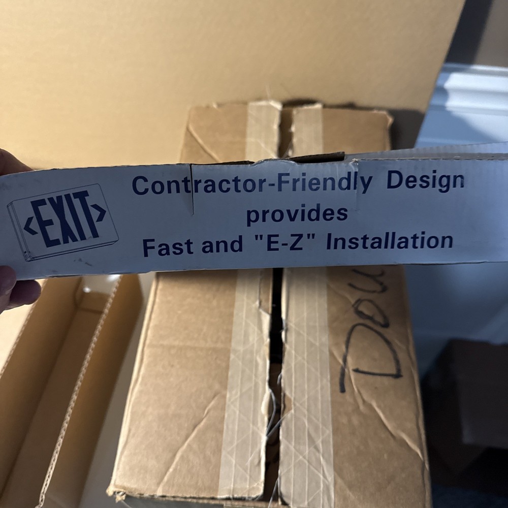 Red Light White Housing Battery Back Up Exit Sign.