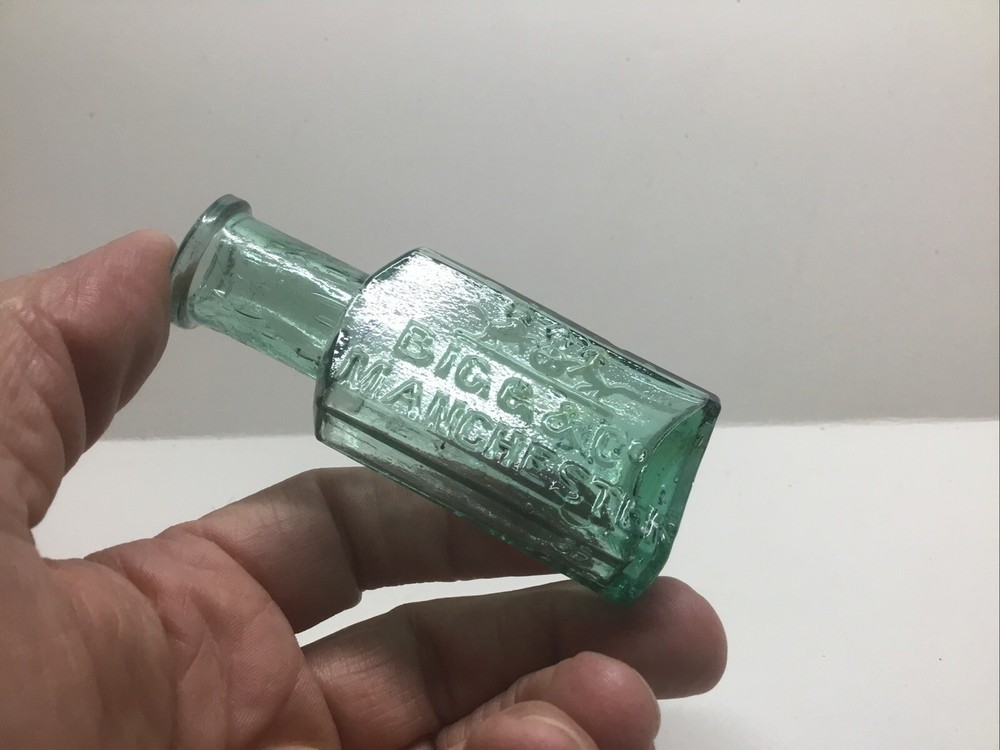 Small Antique Bigg & Co. Trademark Leather Cement Bottle.