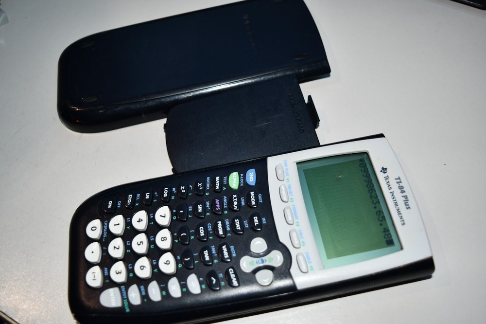 Texas Instruments TI-84 Plus Graphics Calculator with spot on OUTER screen works