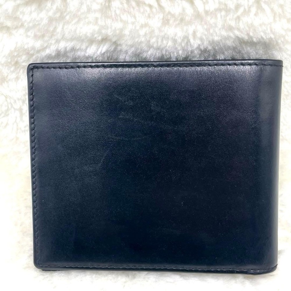 GUCCI Embossed Logo Black Folding Wallet