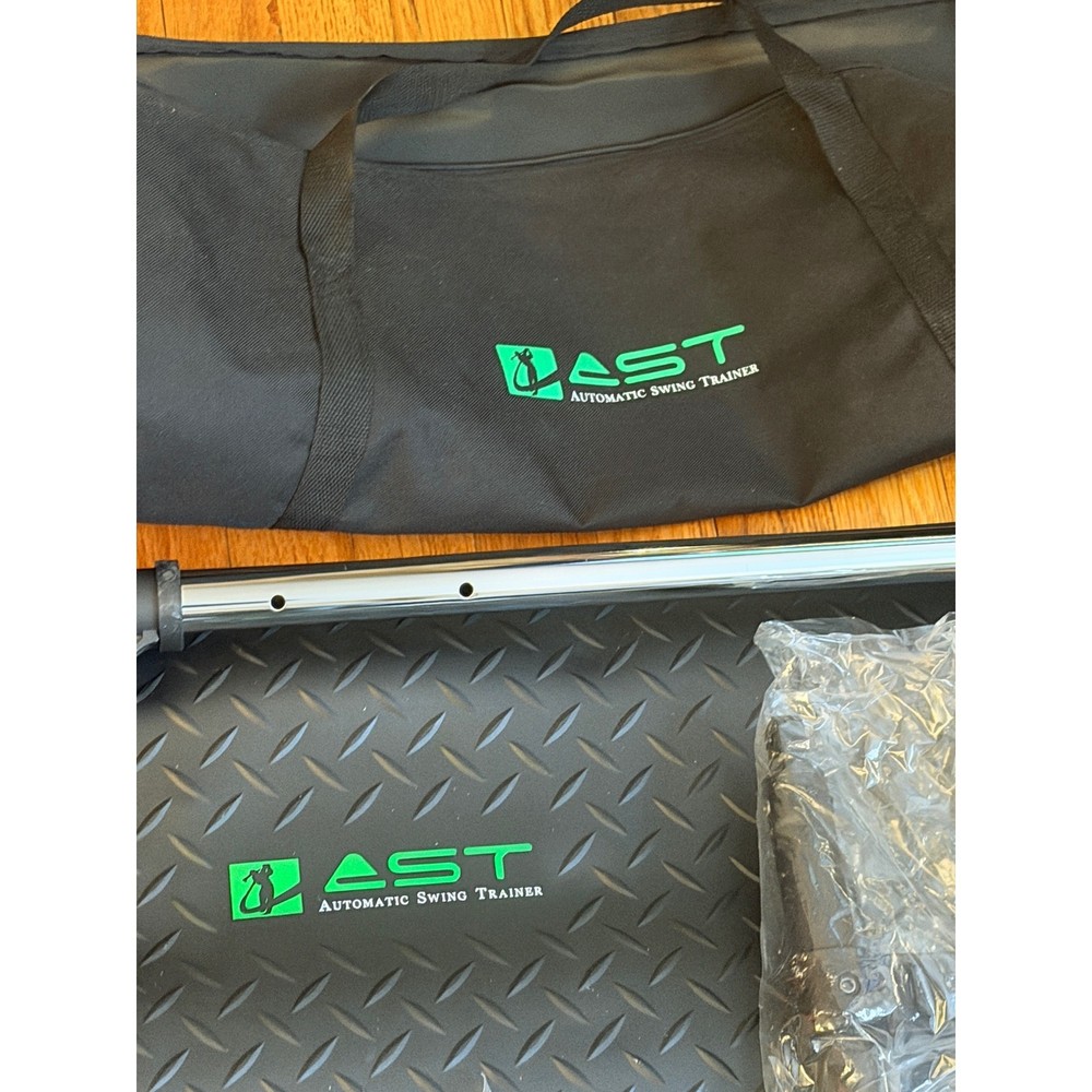 AST Automatic Swing Trainer Golf Training Aid System w/ Base Mat and Travel Bag