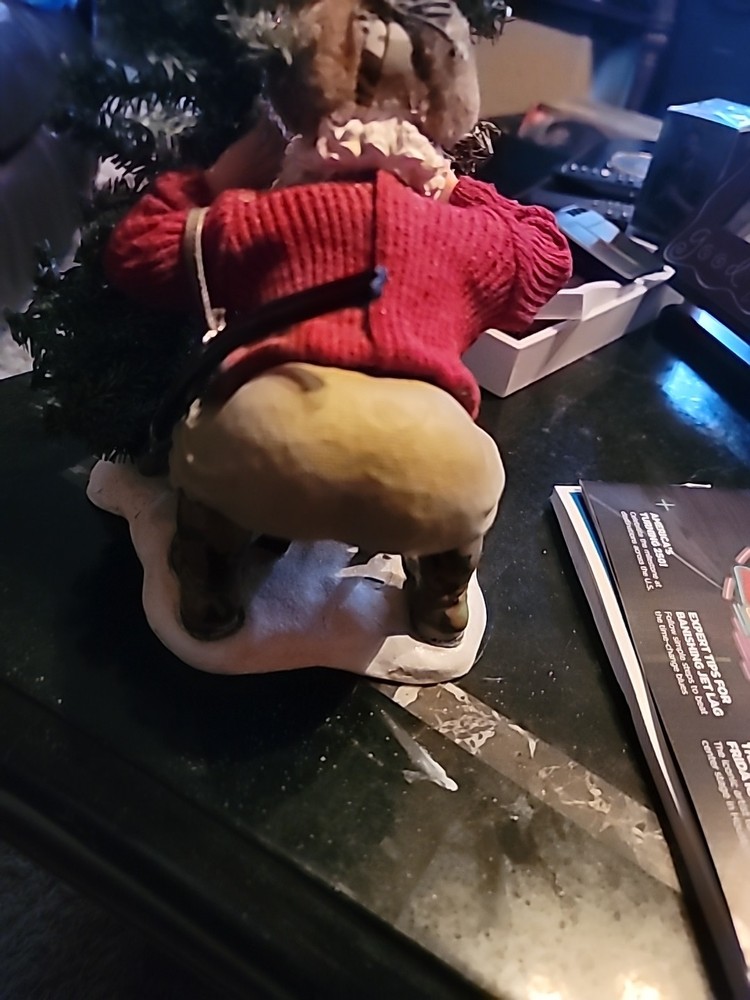 Santa Hiding By A TREE