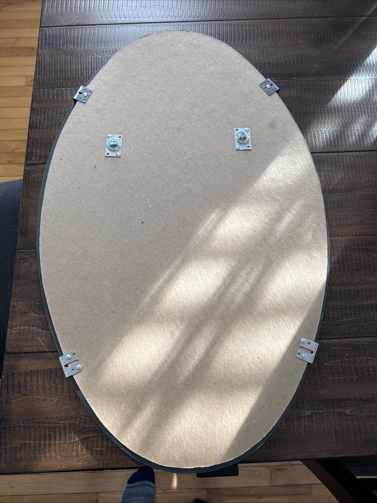 Frameless Oval Shaped Beveled Mirror 31.5" X 19.5"