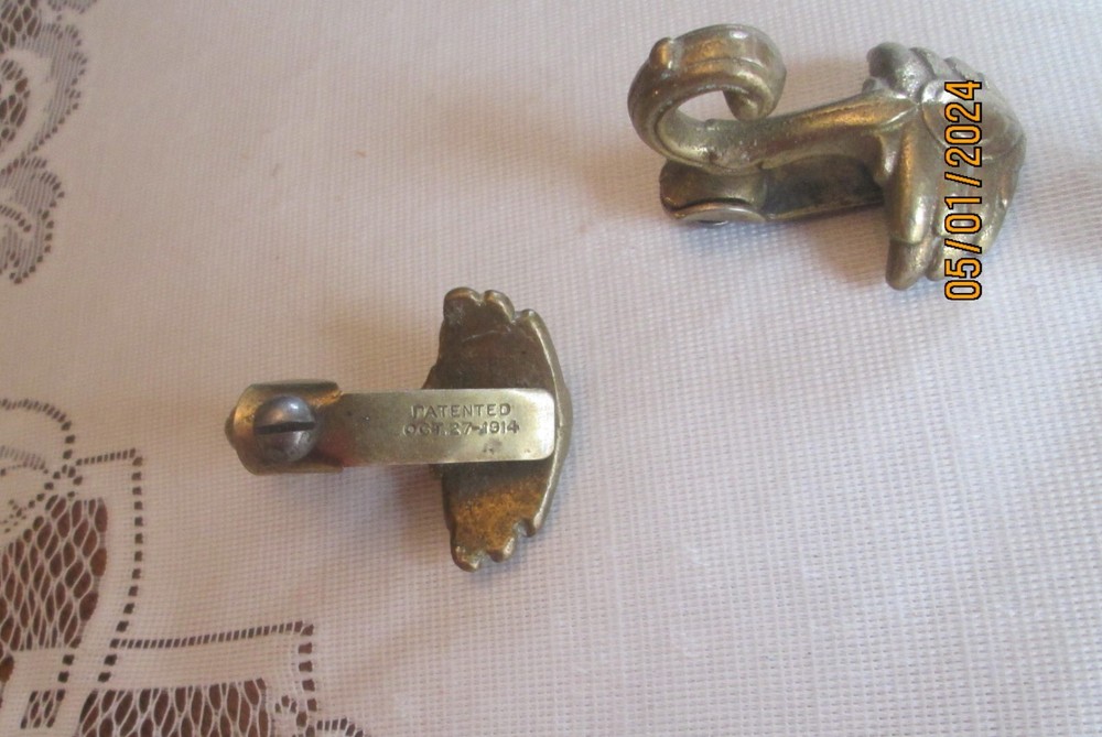 Antique 1914 Brass Wing shaped Hooks