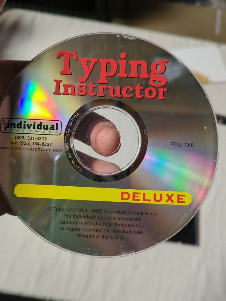 Typing Instructor Deluxe.( 2002 Individual Software).