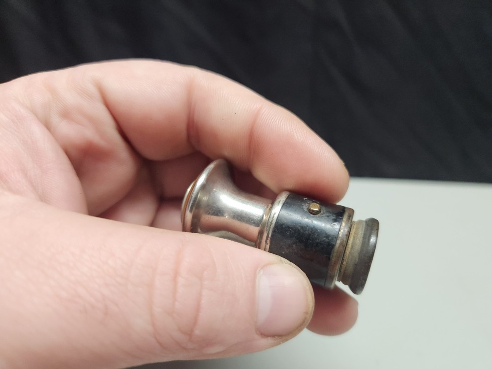 Packard Cigarette Lighter Cats Eye Bakelite Trim