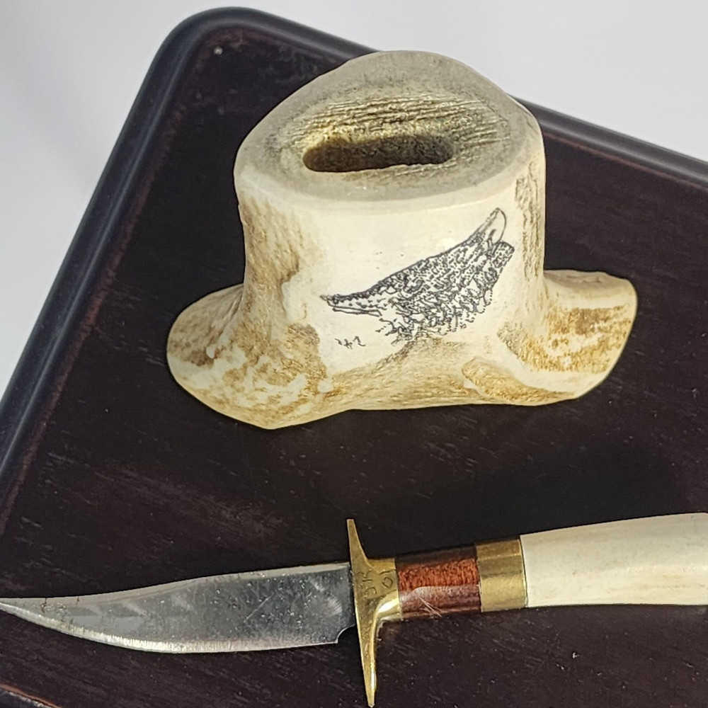 Small Knife In Bone looking Holder With Wolf On