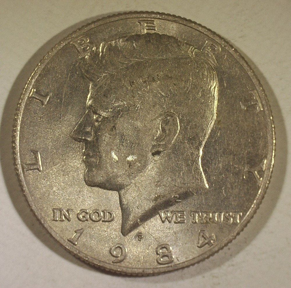 1984-P Kennedy Half Dollar Collar Clash Error ID 01