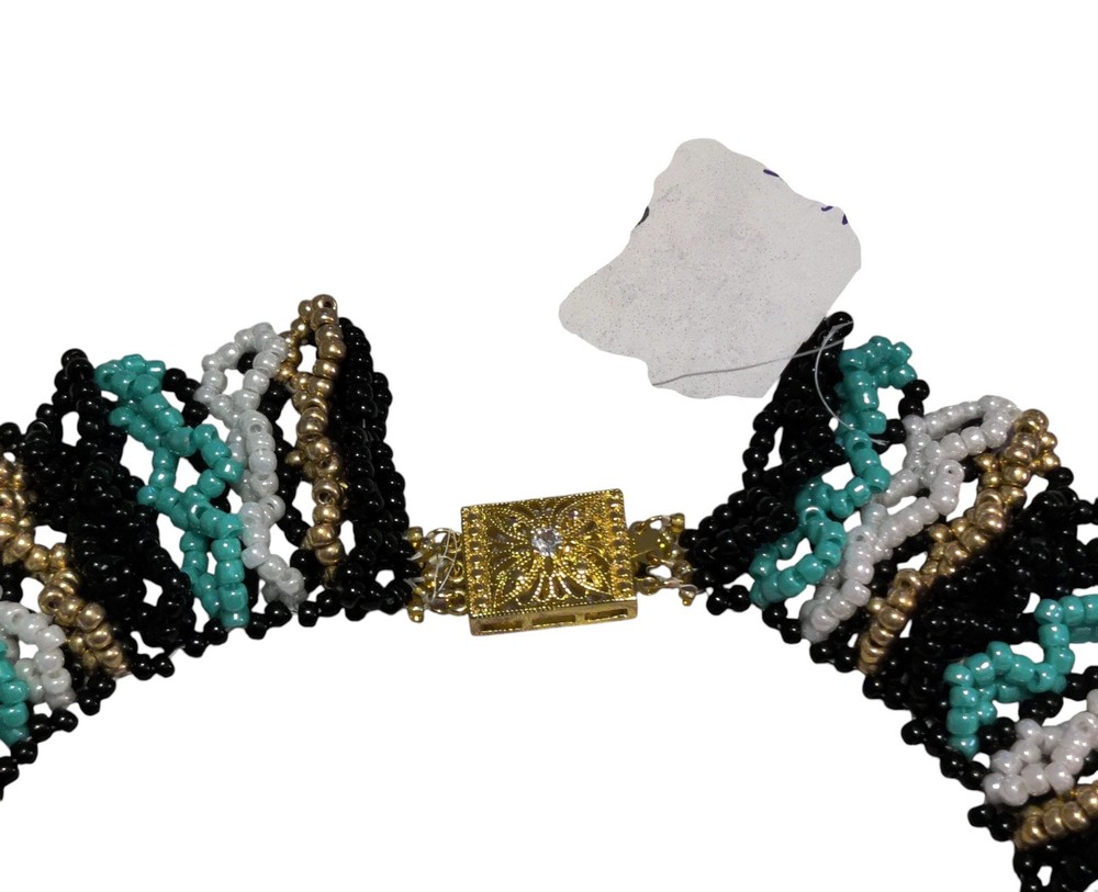 runched netted collar using black, gold-plated, white, and blue seed beeds, ...