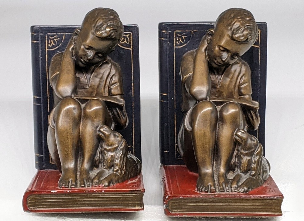 Boy reading with Dog Bookends heavy !