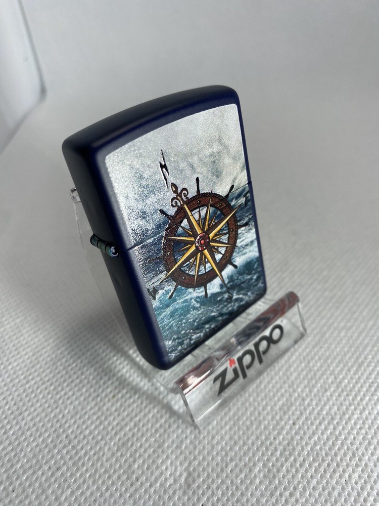 Zippo Compass On A Navy Blue Lighter