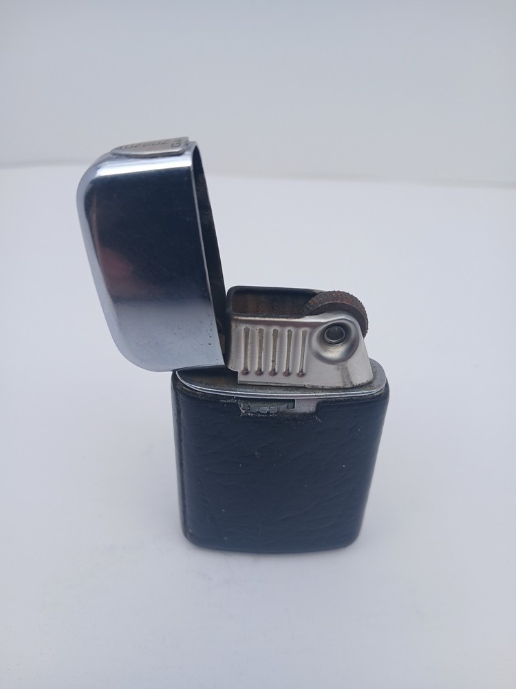 Vintage Ronson Varaflame electronic chrome pocket lighter. Untested.