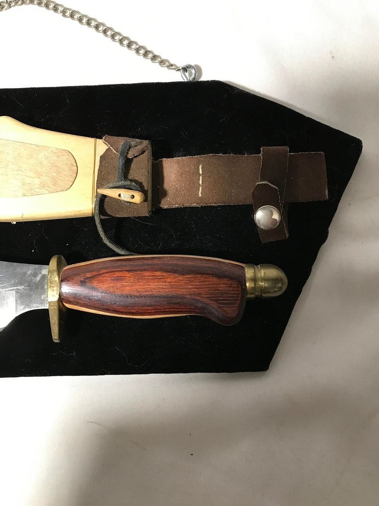 Bowie Knife & sheath, on display rack