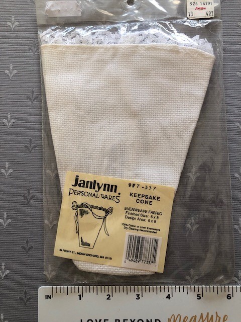 6 various cross stitch items - 2 Keepsake cones, 3 Aida cloths and 1 thread lock