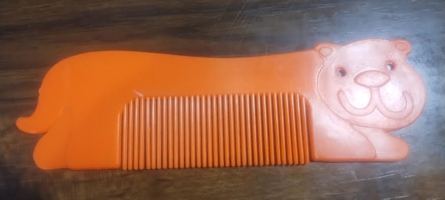 c-p inc comb dog + cat orange