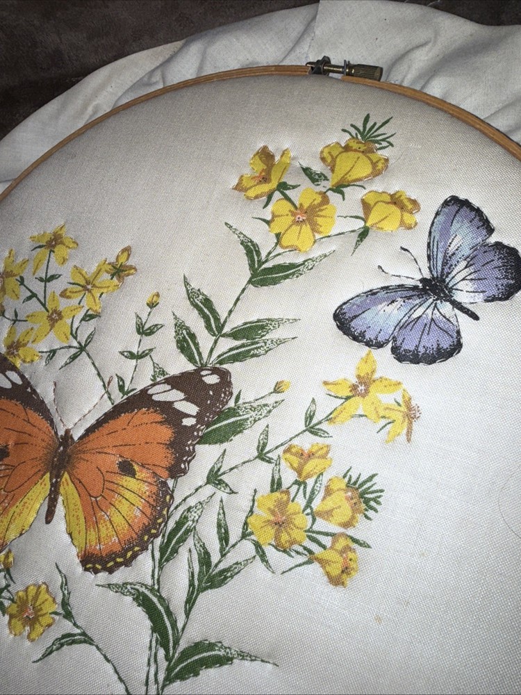 Three Embroidery Hoops With Finished Pieces