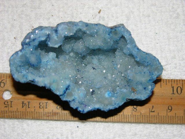 Geode cut & polished half with colored crystal center 3.5 inch E68