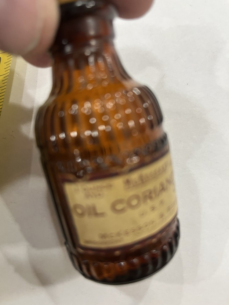 Small Amber Round Ribbed McKESSONS bottle