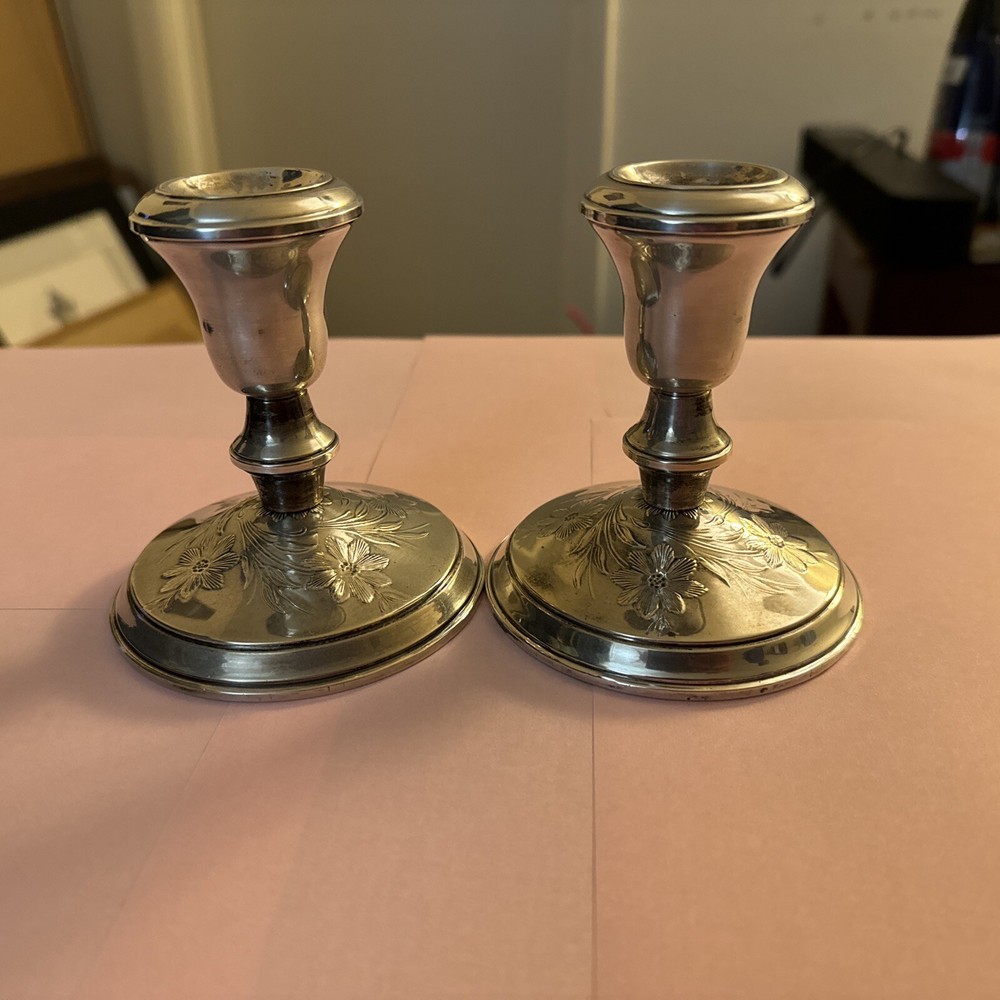 Sterling silver weighted candleholders