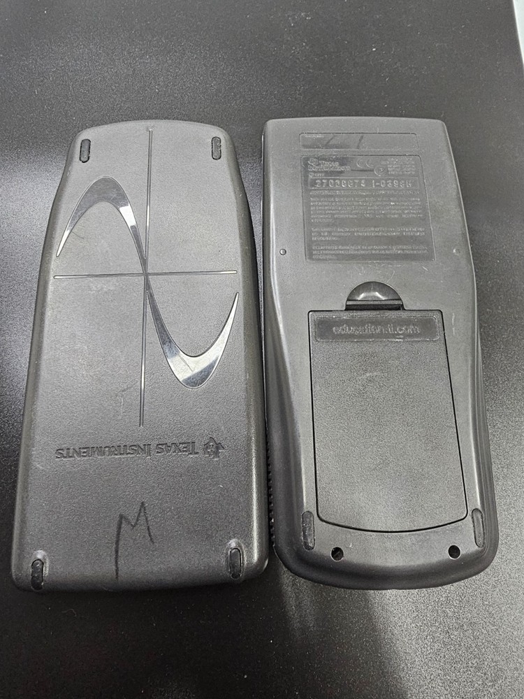 Texas Instruments TI-83 Handheld Graphing Calculator