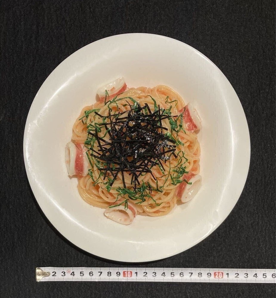 Food replica squid and cod roe pasta with plate