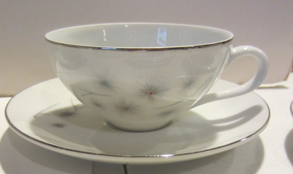 Vintage Creative Platinum Starburst China Dinnerware place settings for 4