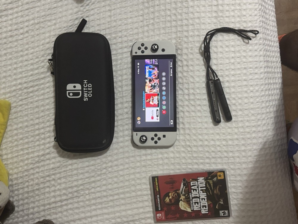 Nintendo Switch OLED Bundle with Red Dead Redemption, Carrying Case, Joy-Cons