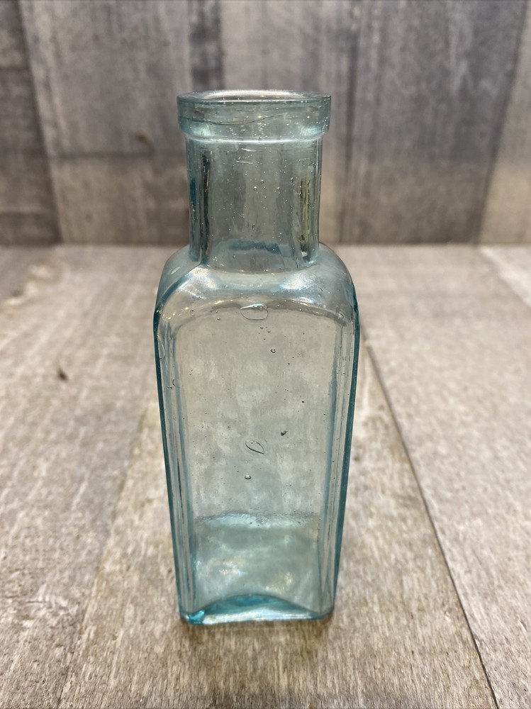 Vintage 5” light blue glass bottle