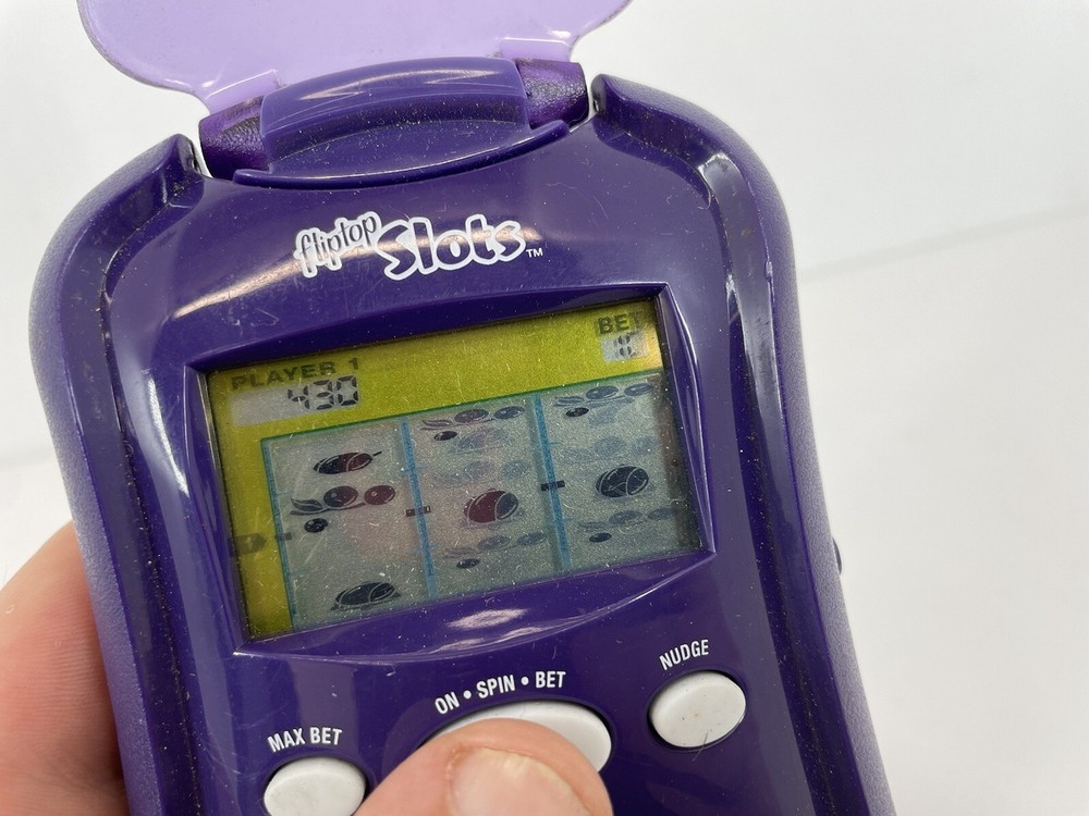 Radica FlipTop Slots Lighted Handheld Electronic Game 2006 Tested Works