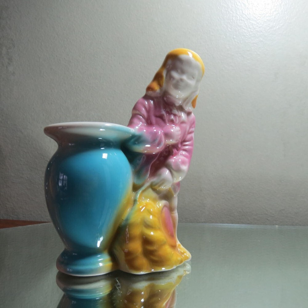 Plume hatted gentleman vintage planter bowing