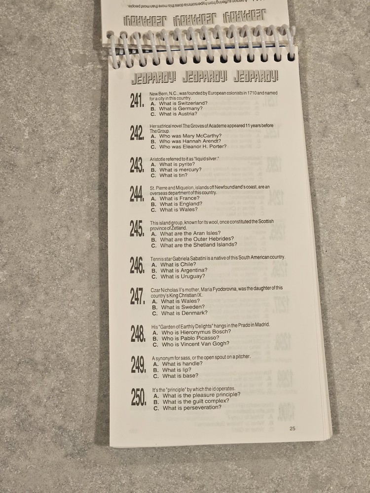 Tiger Electronics Jeopardy Hand Held Game 1995 with Answer Question Book