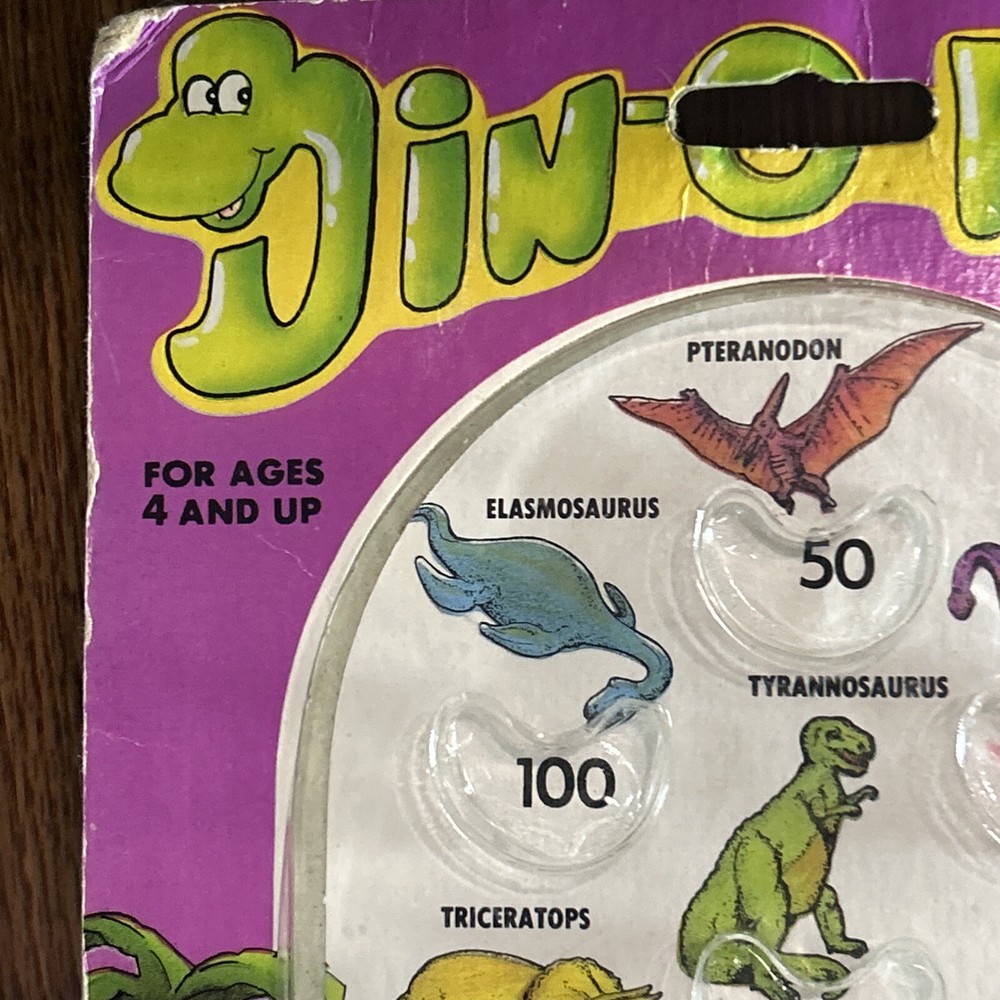 Vintage 1987 Din-o-Flip Handheld Game.