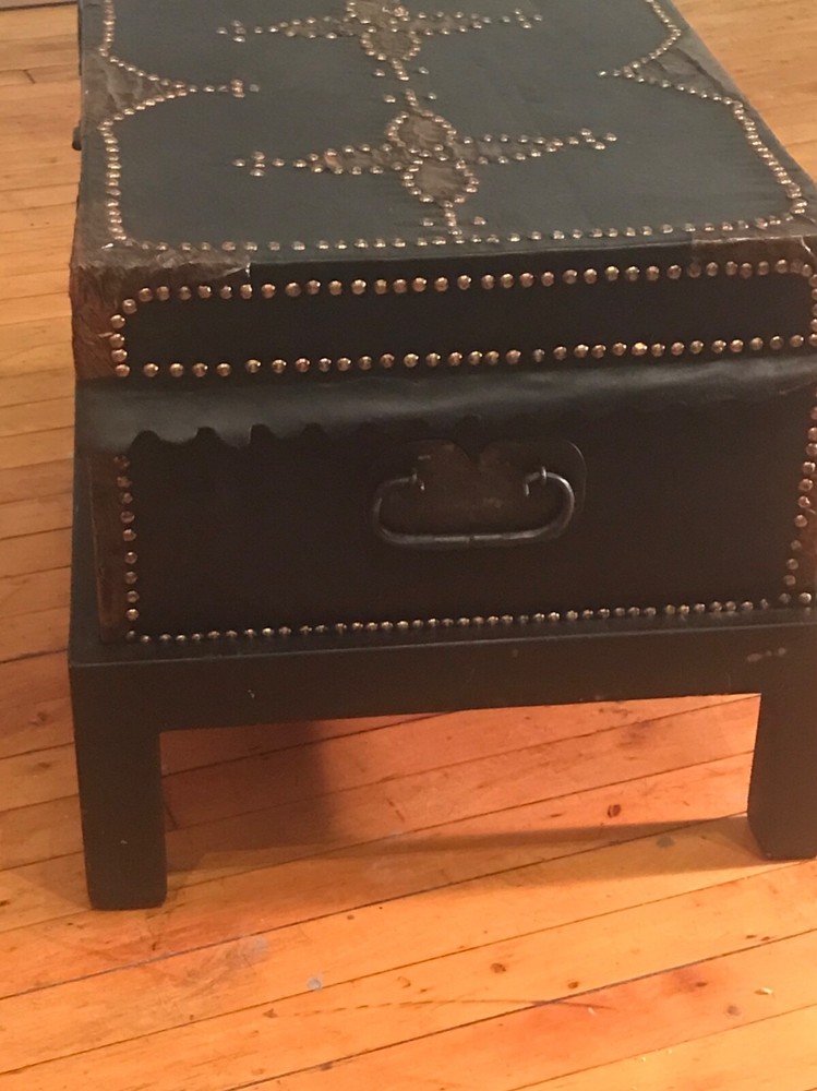 antique trunks chests on a custom stand