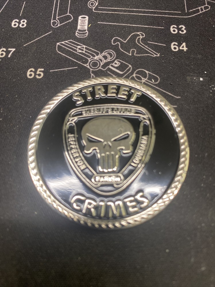 Police street crimes challenge coin