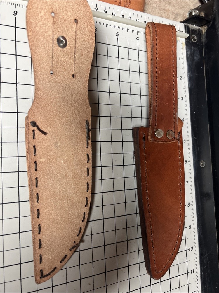 Two Unbranded Leather Sheaths