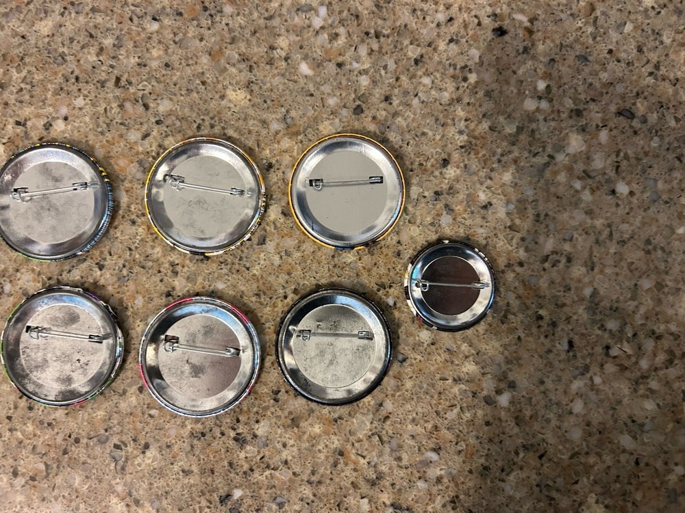 8 Marvel Comic Button Pins Wolverine Magneto Cyclops Silver Surfer Archangel
