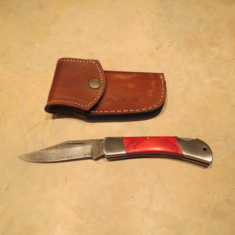 Damascus folding blade knife red laminate handle & leather sheath hand made