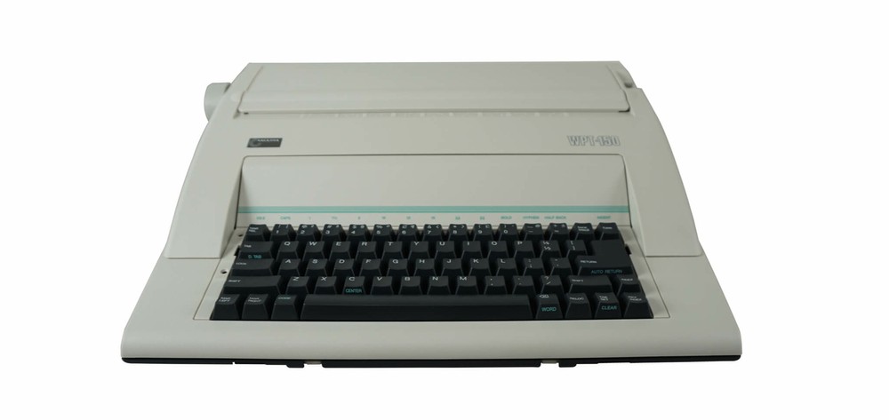 Nakajima WPT-150 Electronic Typewriter and Printwheel Bundle in Spanish