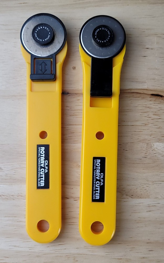 OLFA ROTARY CUTTING MAT & 2 CUTTERS