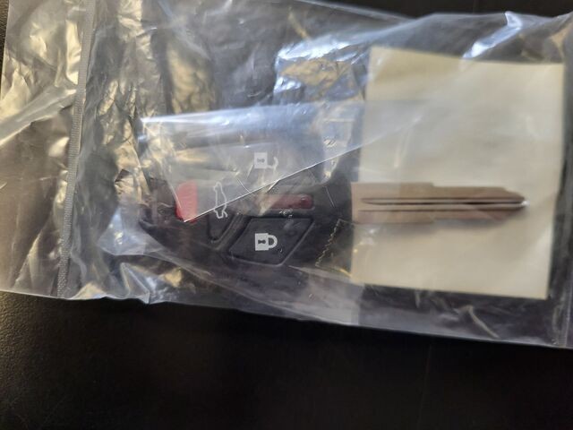 Genuine Mitsubishi Keyless Entry Transmitter MN141545