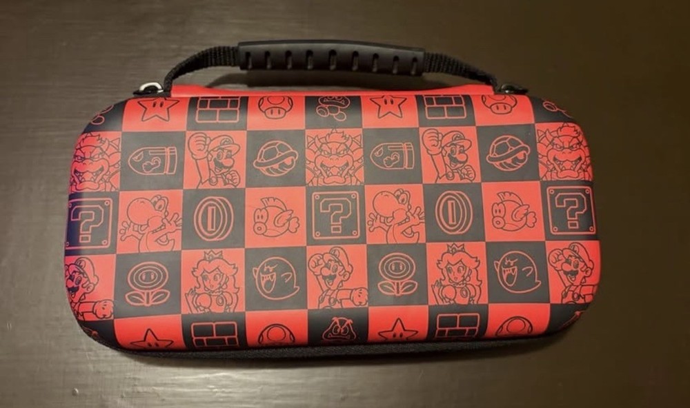 Nintendo Switch Lite Blue Super Mario Case Charger & Game Cartridges